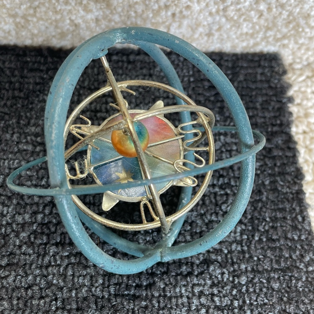 Vintage Gyroscope with Blue and Gold Accents